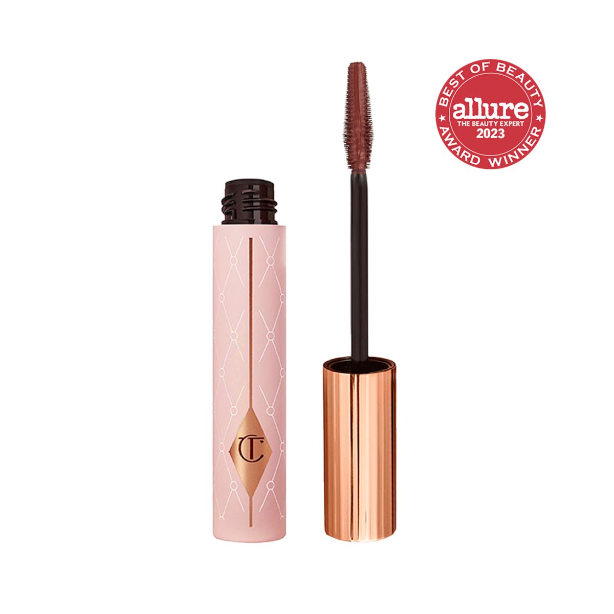 An open tube of a chocolate-brown-coloured mascara in a pink-coloured tube with a gold-coloured lid.