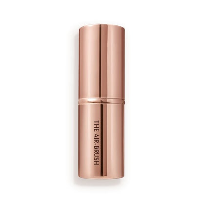 A face blending brush in rose gold packaging.