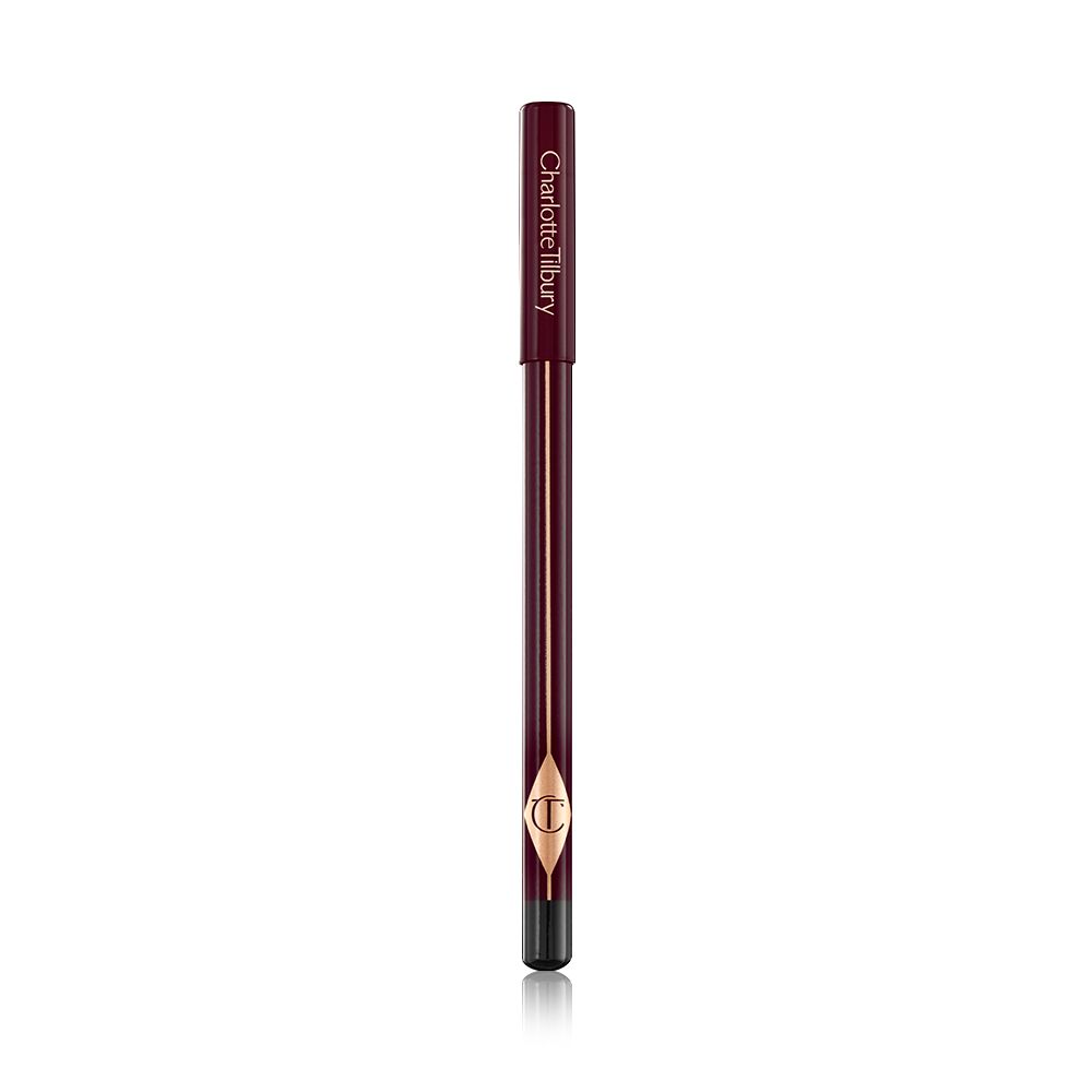 A closed, eyeliner pencil in burgundy packaging with the CT logo printed on it.