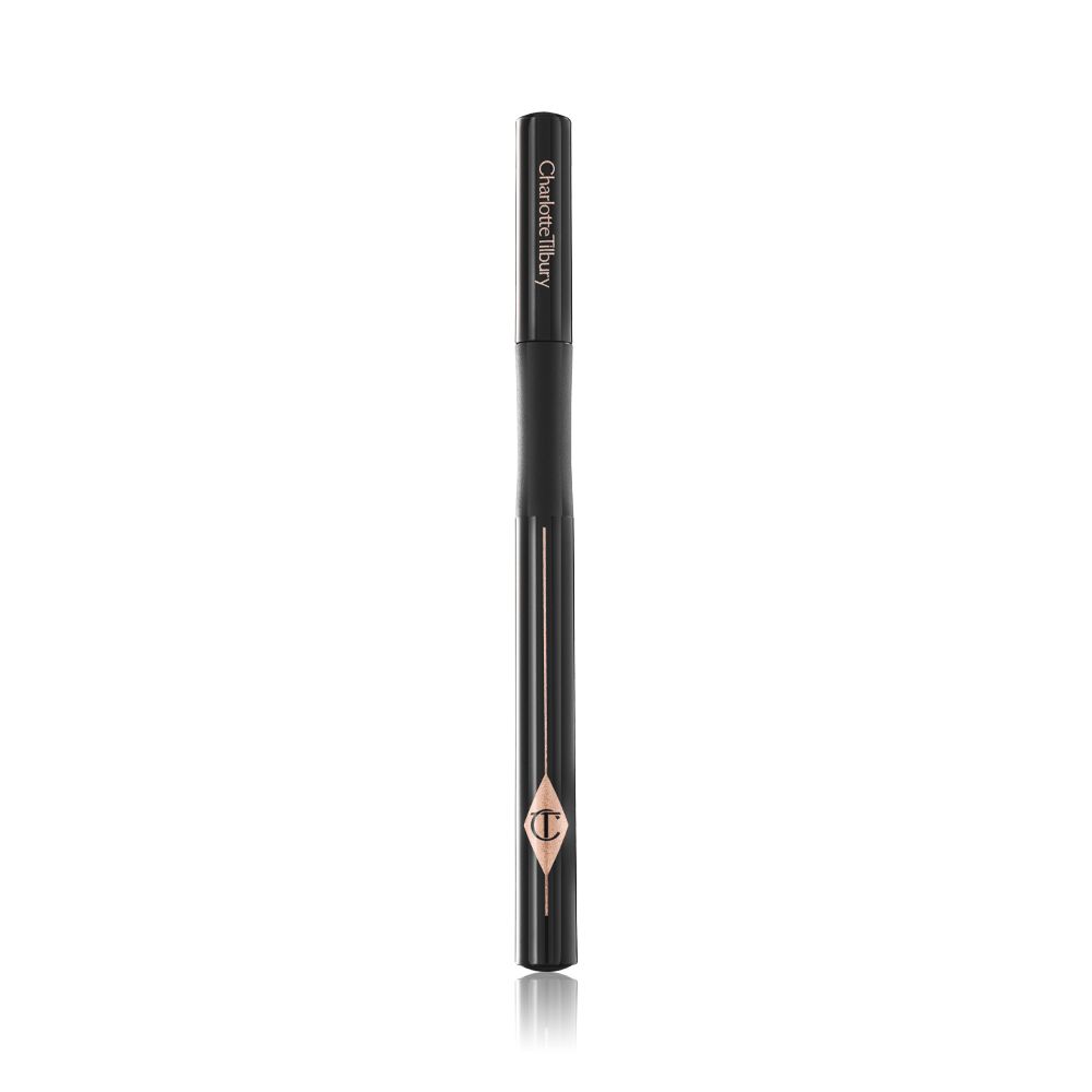 A closed eyeliner pen in jet-black packaging with the iconic CT logo embossed on it.