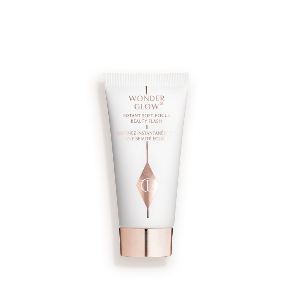White small bottle with a rose-gold lid.