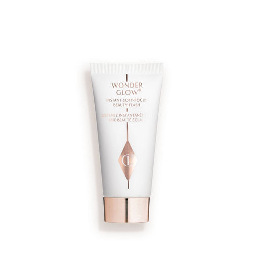 White small bottle with a rose-gold lid.