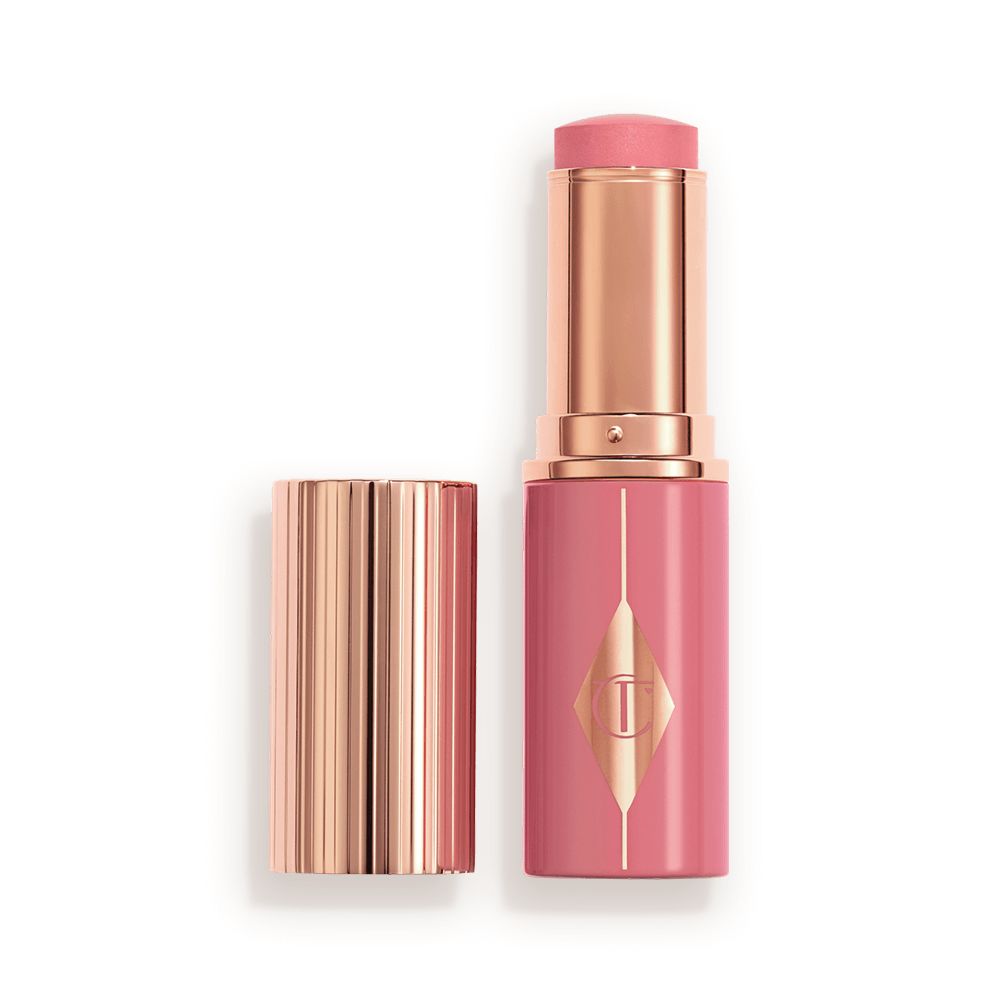 Muted pink packaging matching to the stick product with a rose gold lid and detailing.