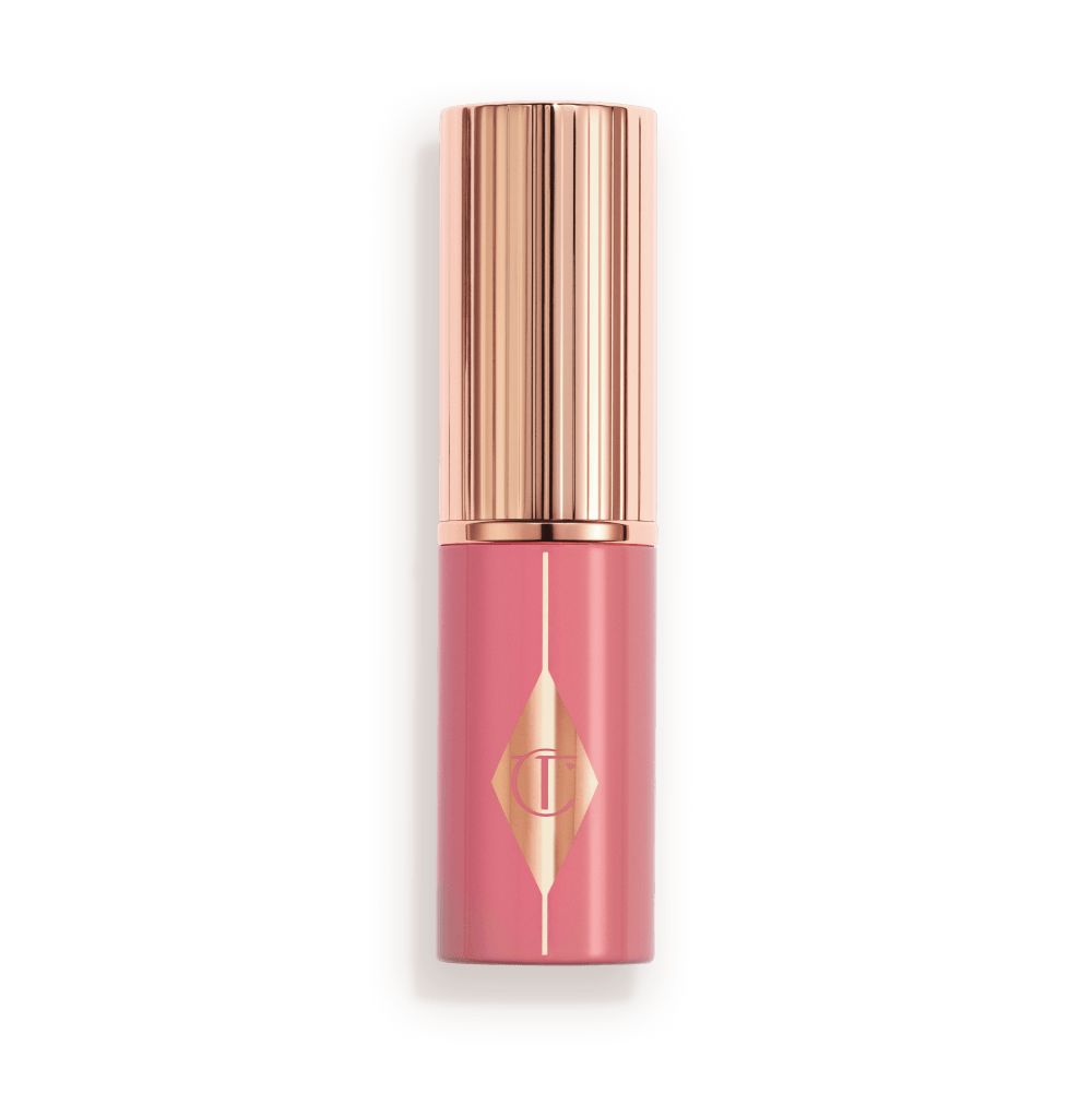 Muted pink packaging with a rose gold lid and detailing.