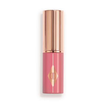 Muted pink packaging with a rose gold lid and detailing.