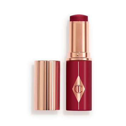 Berry packaging matching to the stick product with a rose gold lid and detailing.
