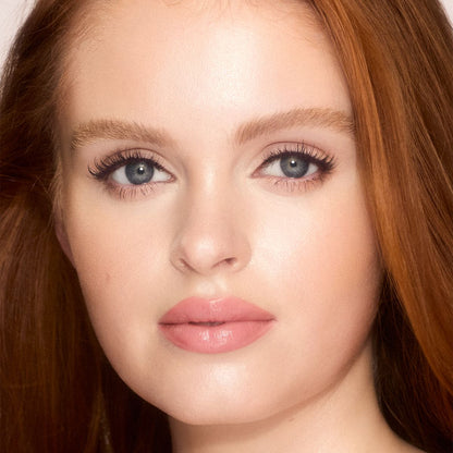 Model wearing UNREAL SKIN SHEER GLOW TINT