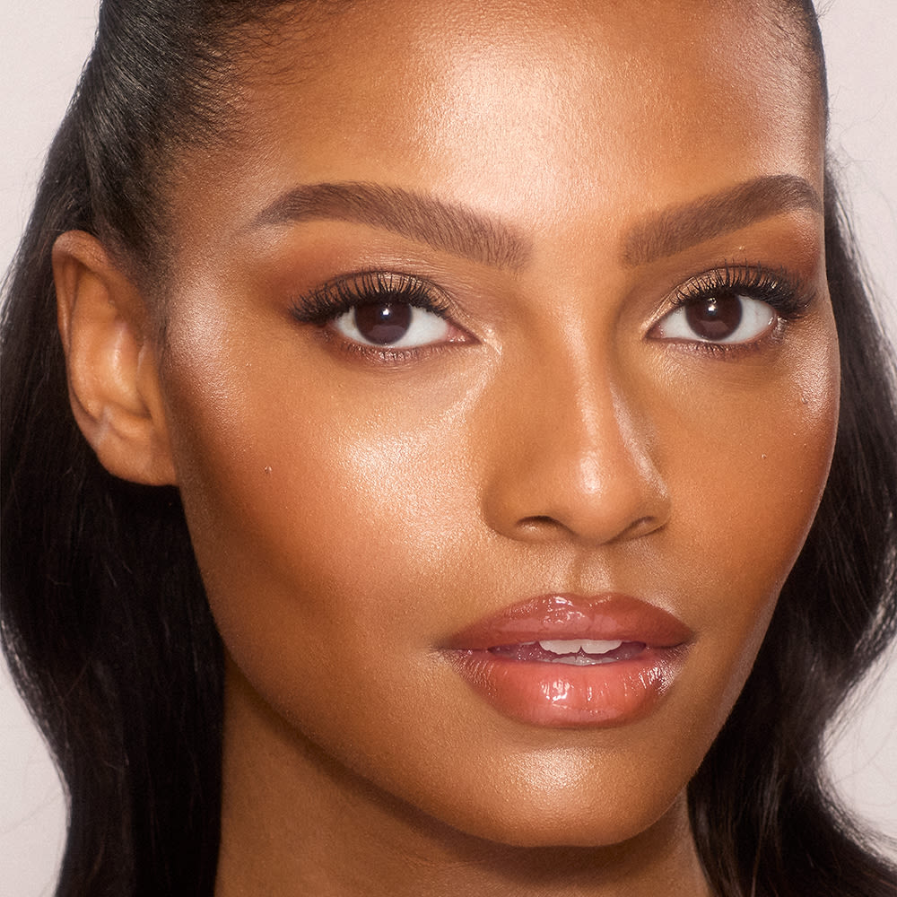 UNREAL SKIN SHEER GLOW TINT - 12 TAN