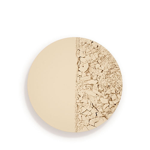 Swatch of a cream-coloured setting powder compact.