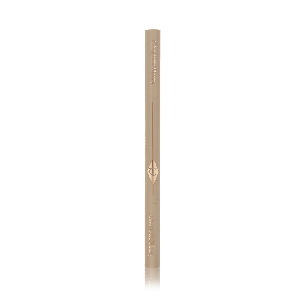 A closed double-ended eyebrow pencil and spoolie brush duo in golden-taupe-coloured packaging.