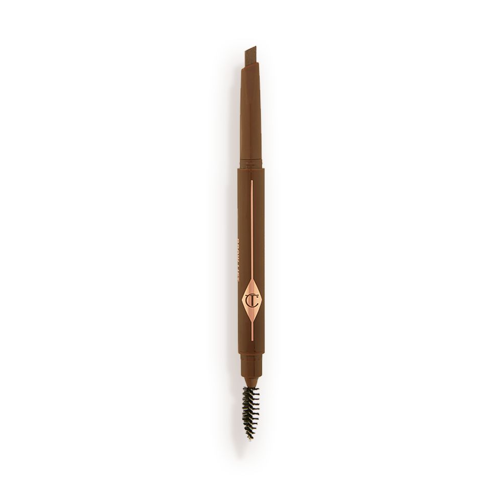 An open, double-ended eyebrow pencil and spoolie brush duo in a medium brown shade with medium-brown-coloured packaging